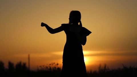Sunset, silhouette, young woman
