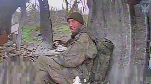 Russian soldier just sits and watches a drone slowly fly towards before exploding