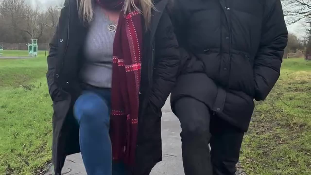 2 girls trample on man