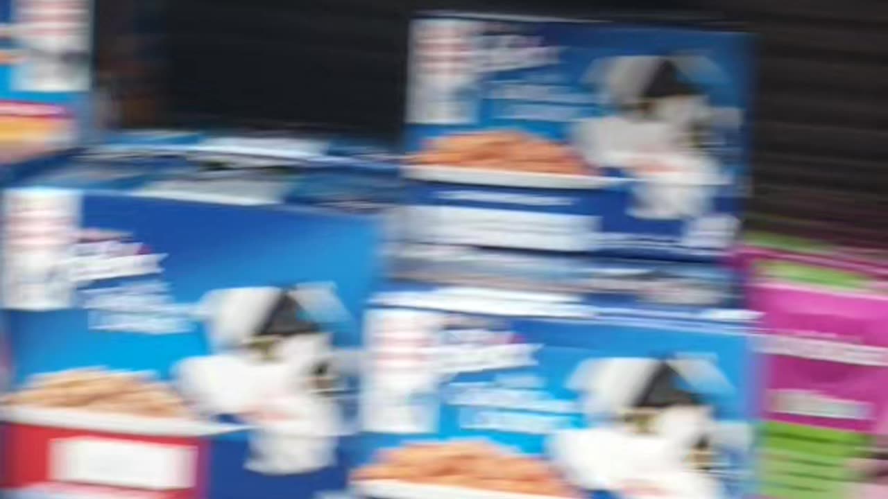 Walk through pet food aisle, stop cue - Woolies