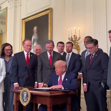 President Donald Trump signs bill to block California's electric car requirements.
