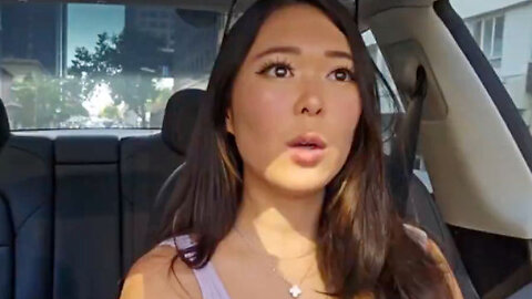 Moron Streaming While Driving Blows Through Red Light Intersection