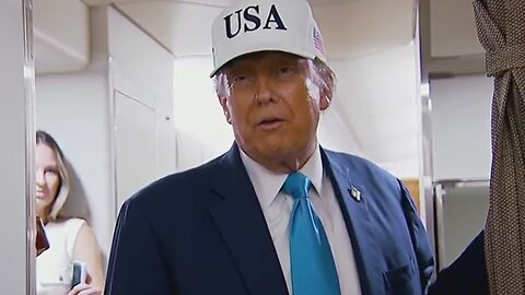 President Trump speaks to reporters on Air Force One