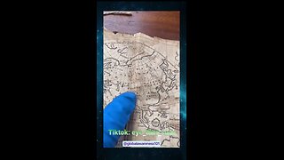 Man shows us book from 1777, the Universal Geographical Grammar