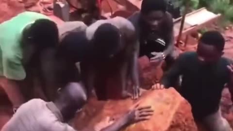 Gold miners discovering the largest gold nugget in the history of Ghana
