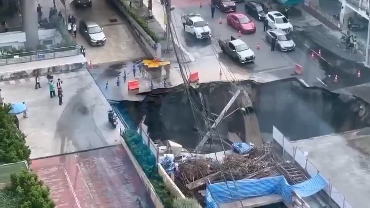 Massive sinkhole opens up in Bangkok, swallowing parts of a busy street
