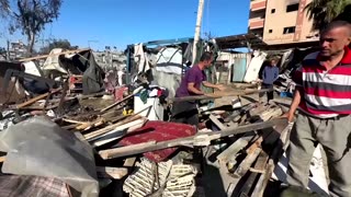 Aftermath of Israeli strikes on school housing displaced Palestinians