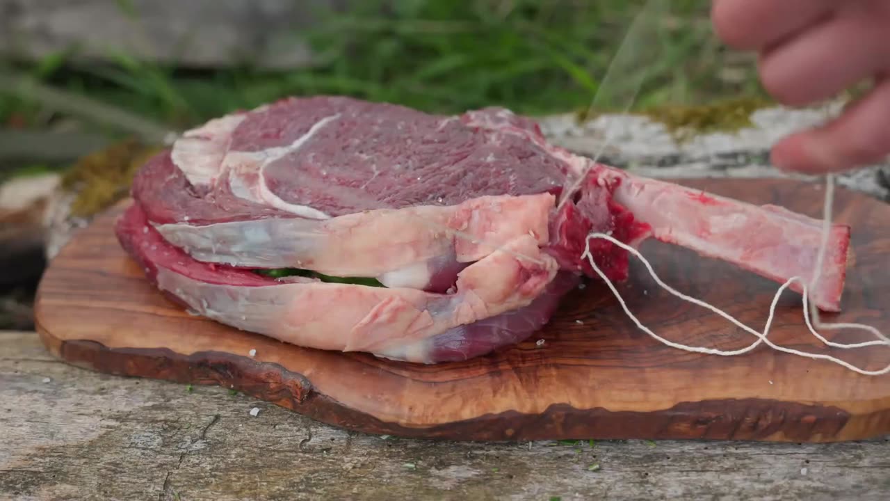Stuffed Tomahawk Steak with Cheese Cooked in the Forest 1
