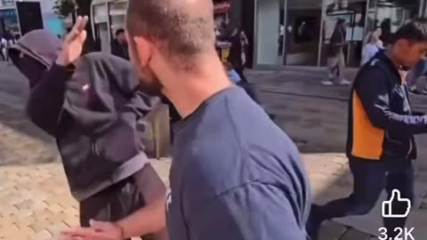 Masked antifa member comes at British YouTuber Charlie Veitch and pulls a knife on him