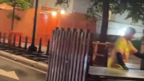 STEEL BARRICADES BEING PUT UP AROUND THE WHITE HOUSE IN THE MIDDLE OF THE NIGHT