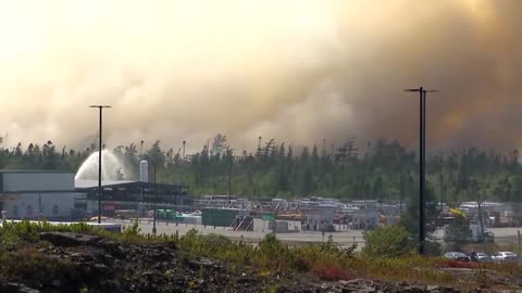 Firefighters battle wildfire near Canada's Halifax 08/13 | The fires are intentional for the Climate Lockdown