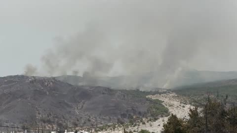 Smoke from wildfires billows over Greece's Rhodes