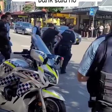 AUSTRALIA: BANK REFUSES TO HAND OVER CASH TO CUSTOMER