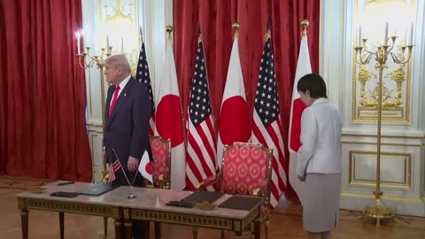 Trump and Japanese PM sign military and trade deals after bilateral meeting.