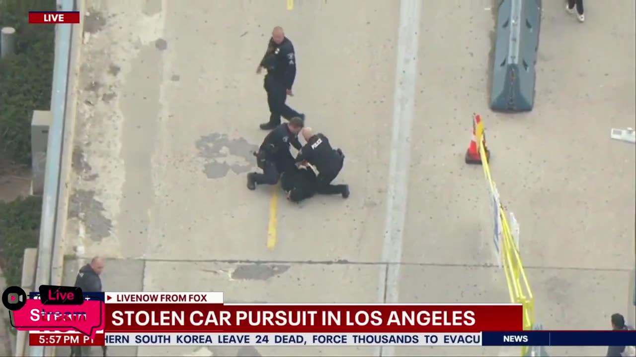 L.A. stolen car chase ends with suspect fleeing