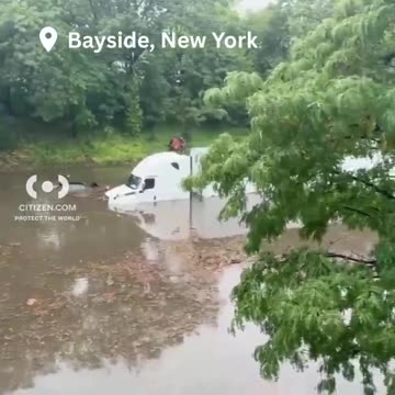 Multiple Vehicles Submerged After Flooding In Queens, New York