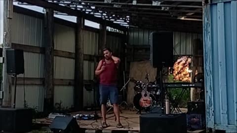 Clayton Preaching at Shoot and Swim 2025