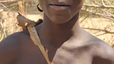 Hadzabe Tribe trying to Say s Happy