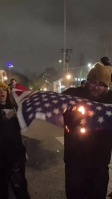 Antifa Burns another Flag outside the Portland ICE Facility.