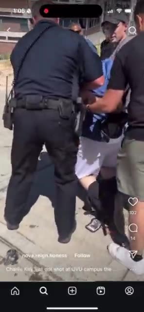 Crowd reacts to Charlie Kirk shooter as being taken away by cops