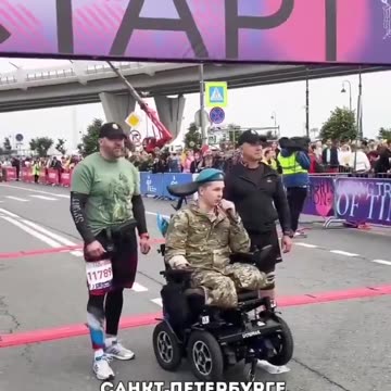 So They Take His Legs Away, and Then Wheel Him into the Street to Give a Speach at a Marathon? Is This Comedy or Irony?