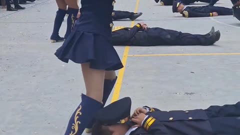 Respectful Boy Covers Face During Dance Routine