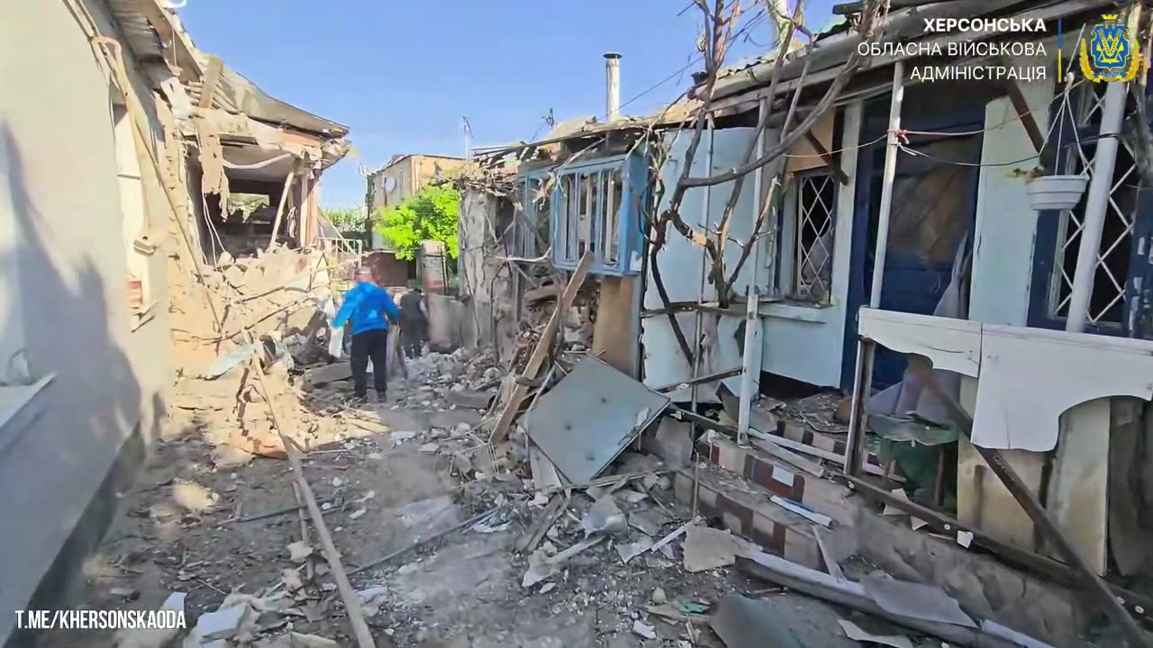 A destroyed house and injured residents in the Korabelny district of Kherson