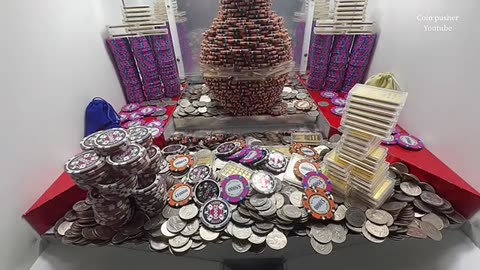 Massive genie in the bottle tower high limit coin pusher