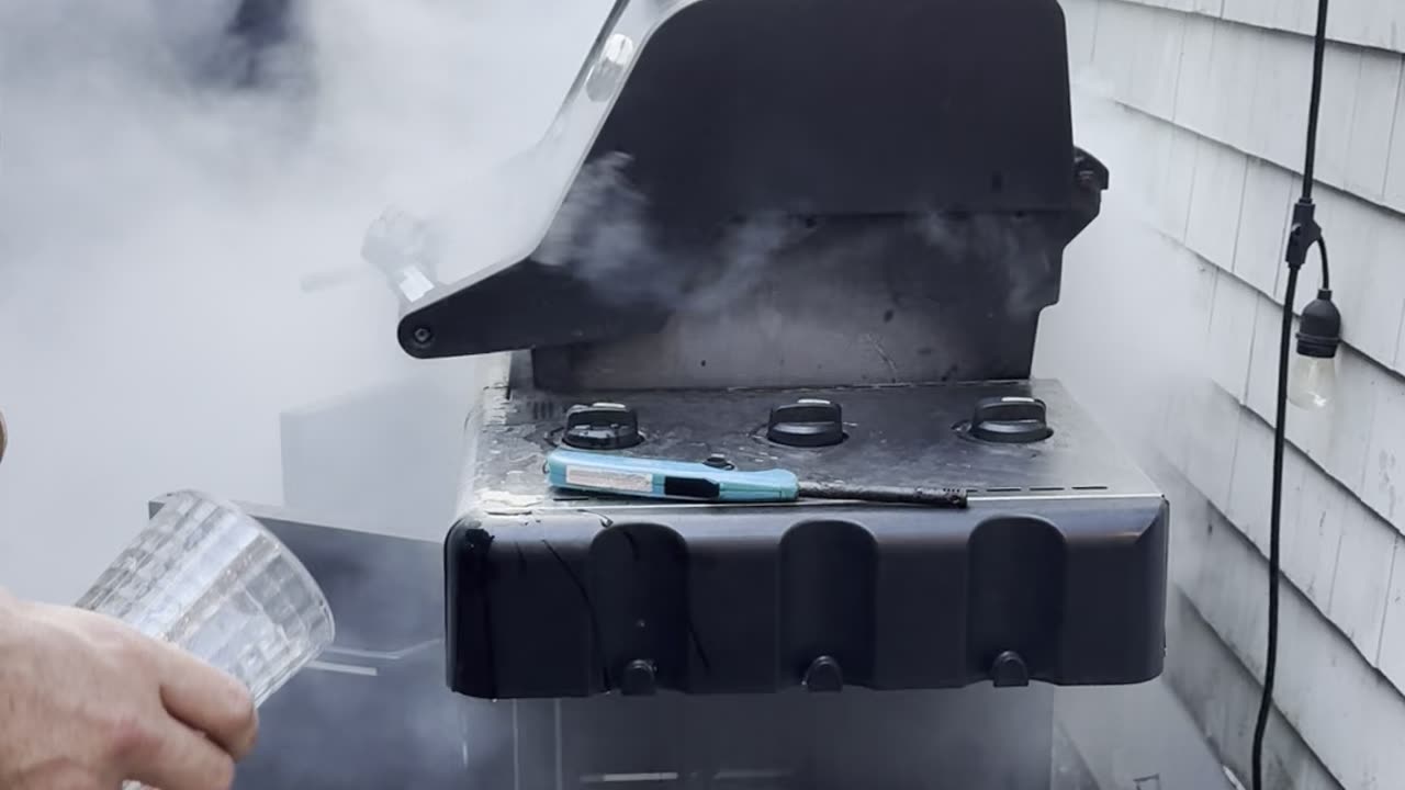 Grill Fire Steams Cooking Chicken