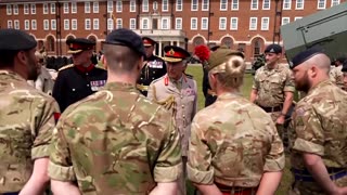 King Charles fires a cannon during visit to Royal Regiment