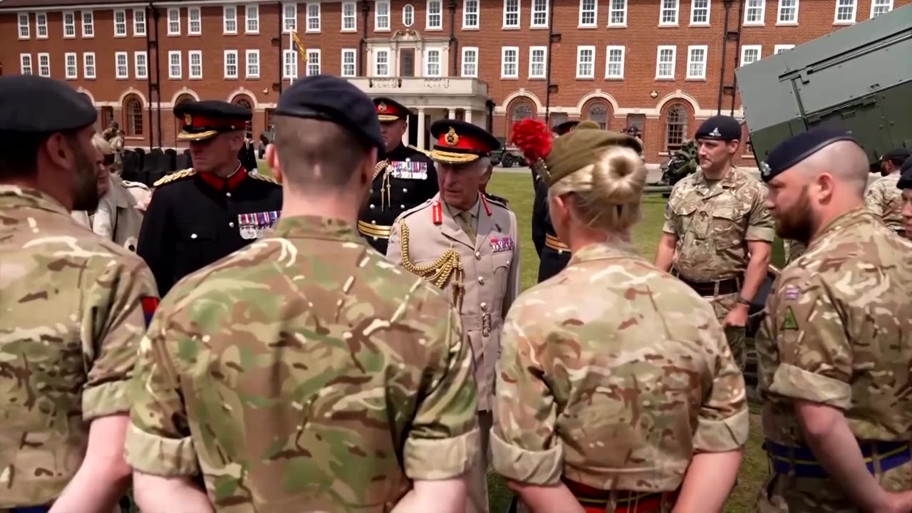 King Charles fires a cannon during visit to Royal Regiment