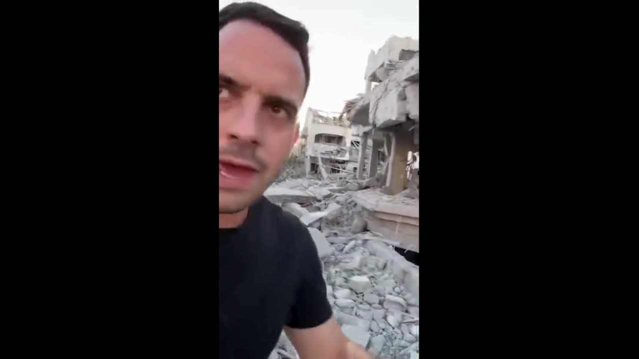 Trey Yingst is on the ground at the site of a missile strike in central Israel — as police, military