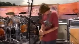 Primus playing "Those Damned Blue Collar Tweakers" at Woodstock 1994.