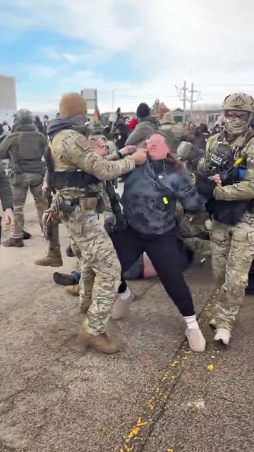 ICE tactical team arrests women after she hit CBP SUVs and spit on agents.