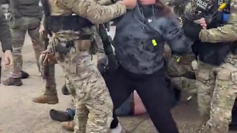 ICE tactical team arrests women after she hit CBP SUVs and spit on agents.