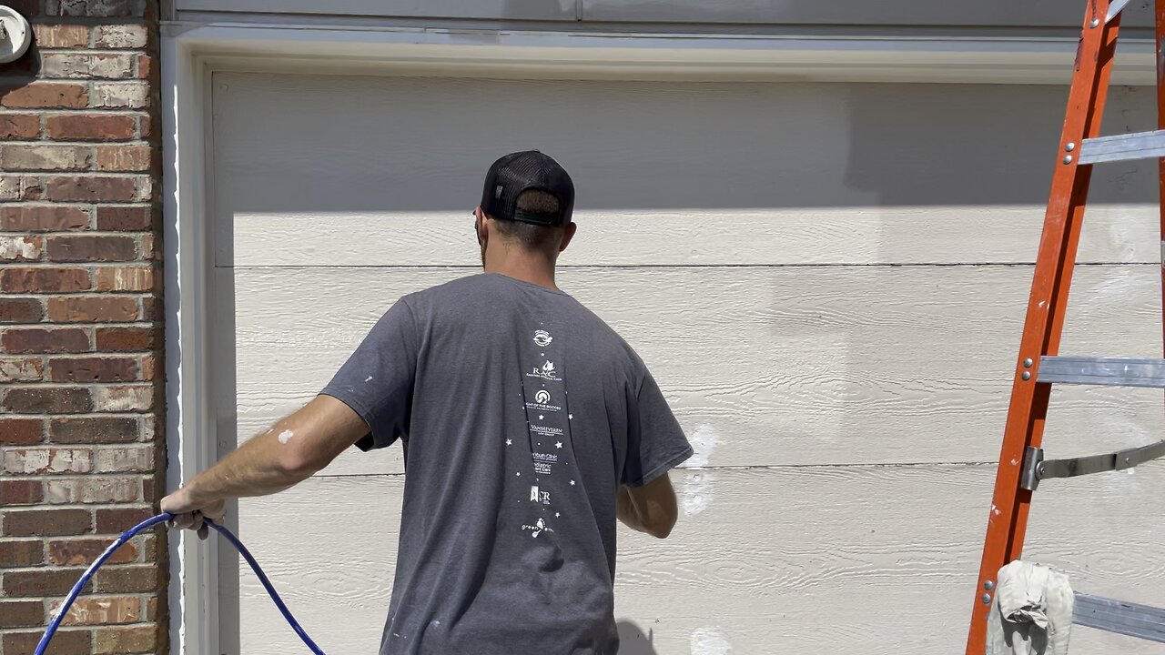 SPRAY PAINTING A GARAGE