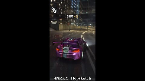 BMW M2 whipping down the street