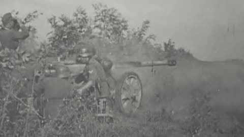 5cm Pak 38 anti-tank gun engaging a trio of bogged down Soviet T-34/76 tanks in 1941