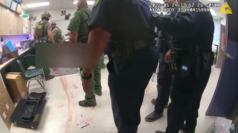 Bodycam of Uvalde officers breaching rooms 111 and 112 during the Robb Elementary Shooting
