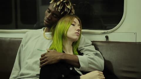 Couple Riding The Subway Together