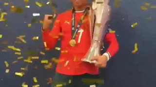 Cristiano Ronaldo Celebrating with the Nations League Trophy