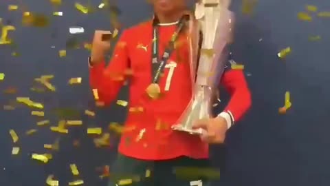 Cristiano Ronaldo Celebrating with the Nations League Trophy