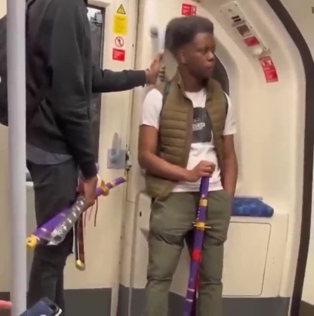 Teenagers openly carrying samurai swords on the london underground