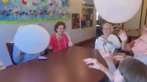 Playing and happy elderly