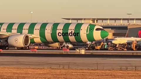 The Airbus A330neo of Condor airline takes off to meet a new day