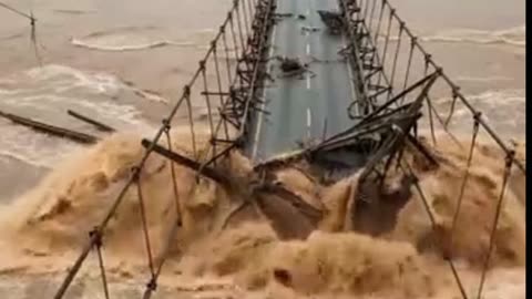 viral floods destroy bridges in indonesia