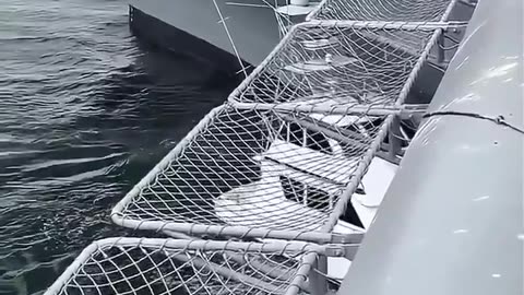 A civilian fishing boat collides with the USS Midway in San Diego, California