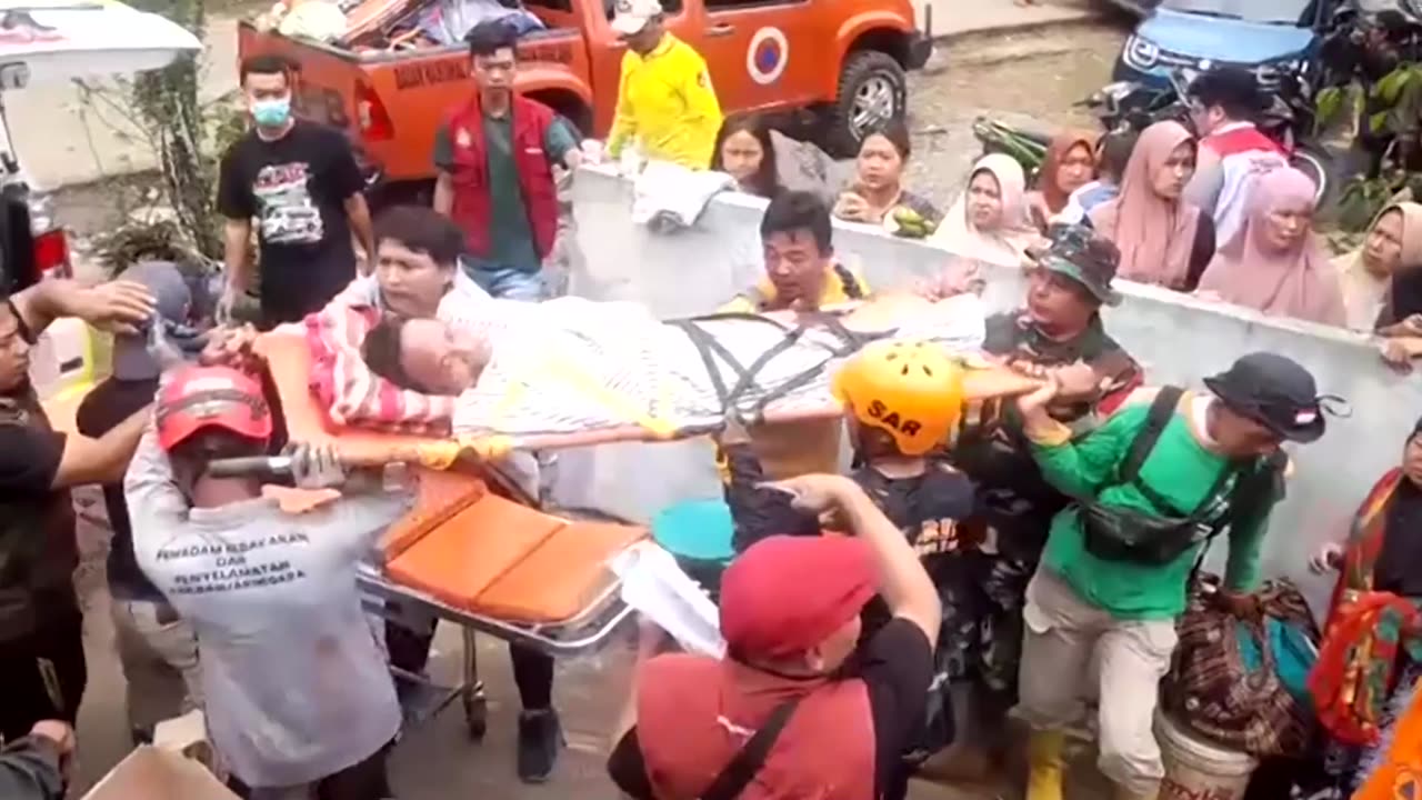 At least two dead, dozens missing in Indonesia landslide