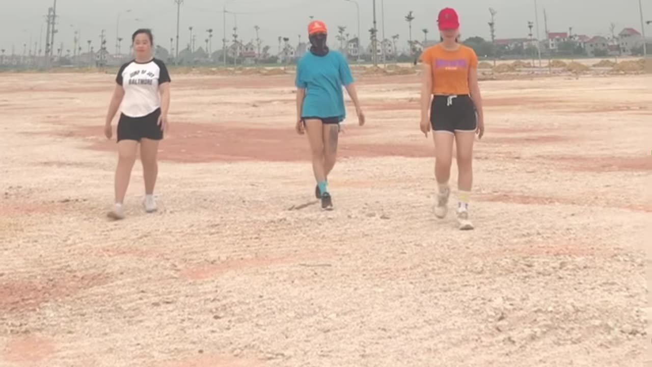 3 sisters walking down the street