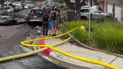 Multiple people are dead onboard a business jet that has crashed into a neighborhood
